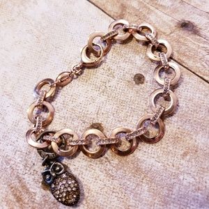 Fossil bracelet with charm